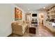 Comfortable sitting area with a sofa and large artwork at 6701 N Scottsdale Rd # 20, Scottsdale, AZ 85250