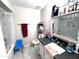Bathroom with a tub, toilet, and vanity with a dark countertop at 9616 W Mountain View Rd # A, Peoria, AZ 85345