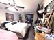 Bright bedroom with a large bed, TV, and ample closet space at 9616 W Mountain View Rd # A, Peoria, AZ 85345