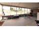 Screened patio with outdoor furniture and backyard view at 9616 W Mountain View Rd # A, Peoria, AZ 85345