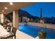 Expansive pool and spa area with mountain views and a modern bar at 10040 E Happy Valley Rd # 1040, Scottsdale, AZ 85255