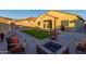 Backyard with fire pit and patio area at 12170 S 184Th Ave, Goodyear, AZ 85338