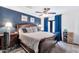 Bright bedroom with a comfortable bed and sliding glass doors to a patio at 12414 N 33Rd St, Phoenix, AZ 85032