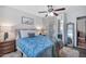 Bright bedroom with a comfortable bed and plenty of closet space at 12414 N 33Rd St, Phoenix, AZ 85032