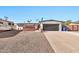 House exterior featuring a driveway, garage, and landscaping at 12414 N 33Rd St, Phoenix, AZ 85032