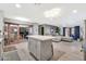 Modern kitchen with island and breakfast bar, open to the living room at 12414 N 33Rd St, Phoenix, AZ 85032
