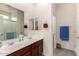 Clean bathroom with a double vanity and ample storage space at 1526 E Saint Catherine Ave, Phoenix, AZ 85042