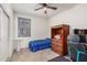 Cozy bedroom with a twin-size bed and built-in storage at 1526 E Saint Catherine Ave, Phoenix, AZ 85042