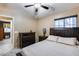 Spacious bedroom with large bed and dresser at 15547 W Magnolia St, Goodyear, AZ 85338