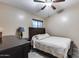 Bedroom with a double bed and ceiling fan at 15547 W Magnolia St, Goodyear, AZ 85338