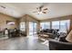 Bright dining area with tile floor and view to backyard at 15547 W Magnolia St, Goodyear, AZ 85338