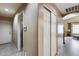 Clean hallway with access to bathroom and other rooms at 15547 W Magnolia St, Goodyear, AZ 85338