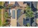 Aerial view showcasing home's roofline and solar panels at 20566 N Lemon Drop Dr, Maricopa, AZ 85138