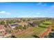 Aerial view of house with solar panels and backyard at 20566 N Lemon Drop Dr, Maricopa, AZ 85138