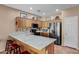 Updated kitchen featuring granite countertops and stainless steel appliances at 20566 N Lemon Drop Dr, Maricopa, AZ 85138