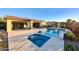 Large pool, spa and outdoor kitchen area at 20728 W Pasadena Ave, Buckeye, AZ 85396