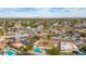 Aerial view of neighborhood showcasing houses, palm trees, and pools at 2325 E Hermosa Dr, Tempe, AZ 85282