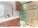 Bathroom boasts granite vanity and updated shower at 2325 E Hermosa Dr, Tempe, AZ 85282