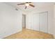 Bright bedroom with tile flooring and double door closet at 2325 E Hermosa Dr, Tempe, AZ 85282