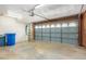 Garage with automatic door opener and storage at 2325 E Hermosa Dr, Tempe, AZ 85282