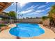 Enjoy this refreshing kidney-shaped pool at 2325 E Hermosa Dr, Tempe, AZ 85282