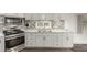 Modern kitchen boasts stainless steel appliances and stylish tile backsplash at 44 S Hawes Rd # A15, Mesa, AZ 85208