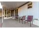 Covered patio with table and chairs, adjacent to mobile home at 44 S Hawes Rd # A15, Mesa, AZ 85208