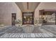 The building's entrance features a grand design with ornate tile work and potted plants at 114 W Adams St # 506, Phoenix, AZ 85003
