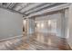 Spacious living room with hardwood floors and exposed beams, offering an open and airy feel at 114 W Adams St # 506, Phoenix, AZ 85003