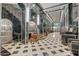 Lobby with marble and patterned flooring, a staircase, and decorative features at 114 W Adams St # 506, Phoenix, AZ 85003