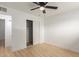 Bright bedroom with ceiling fan and closet at 15 N Ashland St, Mesa, AZ 85203