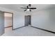 Bedroom with ceiling fan and access to closet and other rooms at 17842 N 43Rd St, Phoenix, AZ 85032