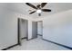 Bedroom with ceiling fan, closet, and door to another room at 17842 N 43Rd St, Phoenix, AZ 85032