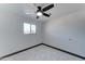 Well-lit bedroom with ceiling fan and window at 17842 N 43Rd St, Phoenix, AZ 85032