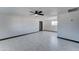 Spacious living room with tile floors and ceiling fan at 17842 N 43Rd St, Phoenix, AZ 85032