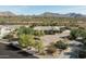 Single-story home nestled in a desert landscape at 24209 N 87Th St, Scottsdale, AZ 85255