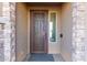 Elegant front door with decorative iron screen at 27712 N Hibiscus Ln, San Tan Valley, AZ 85143