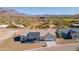 Aerial view of single-story home with desert landscape and mountain backdrop at 3877 S Veronica Ln, Gold Canyon, AZ 85118