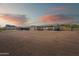 Large, flat backyard with gravel and mountain views at 3877 S Veronica Ln, Gold Canyon, AZ 85118