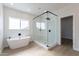 Spa-like bathroom with soaking tub and large walk-in shower at 3877 S Veronica Ln, Gold Canyon, AZ 85118