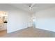 Bright bedroom with wood-look floors and access to bathroom at 3877 S Veronica Ln, Gold Canyon, AZ 85118