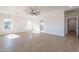 Bright bedroom with wood-look floors and ceiling fan at 3877 S Veronica Ln, Gold Canyon, AZ 85118