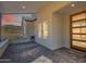 Covered patio with mountain views and a modern front door at 3877 S Veronica Ln, Gold Canyon, AZ 85118