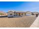 Modern single story home with covered porch and gravel landscaping at 3877 S Veronica Ln, Gold Canyon, AZ 85118