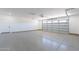 Spacious garage with epoxy flooring and automatic opener at 3877 S Veronica Ln, Gold Canyon, AZ 85118
