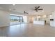 Open living area with kitchen, island, and backyard access at 3877 S Veronica Ln, Gold Canyon, AZ 85118
