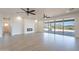 Spacious living room with fireplace and sliding doors to patio at 3877 S Veronica Ln, Gold Canyon, AZ 85118