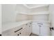 Bright walk-in pantry with white cabinets and quartz countertops at 3877 S Veronica Ln, Gold Canyon, AZ 85118