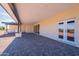 Covered patio with pavers, double doors, and views at 3877 S Veronica Ln, Gold Canyon, AZ 85118