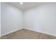 Empty spare room with light wood-look floors at 3877 S Veronica Ln, Gold Canyon, AZ 85118